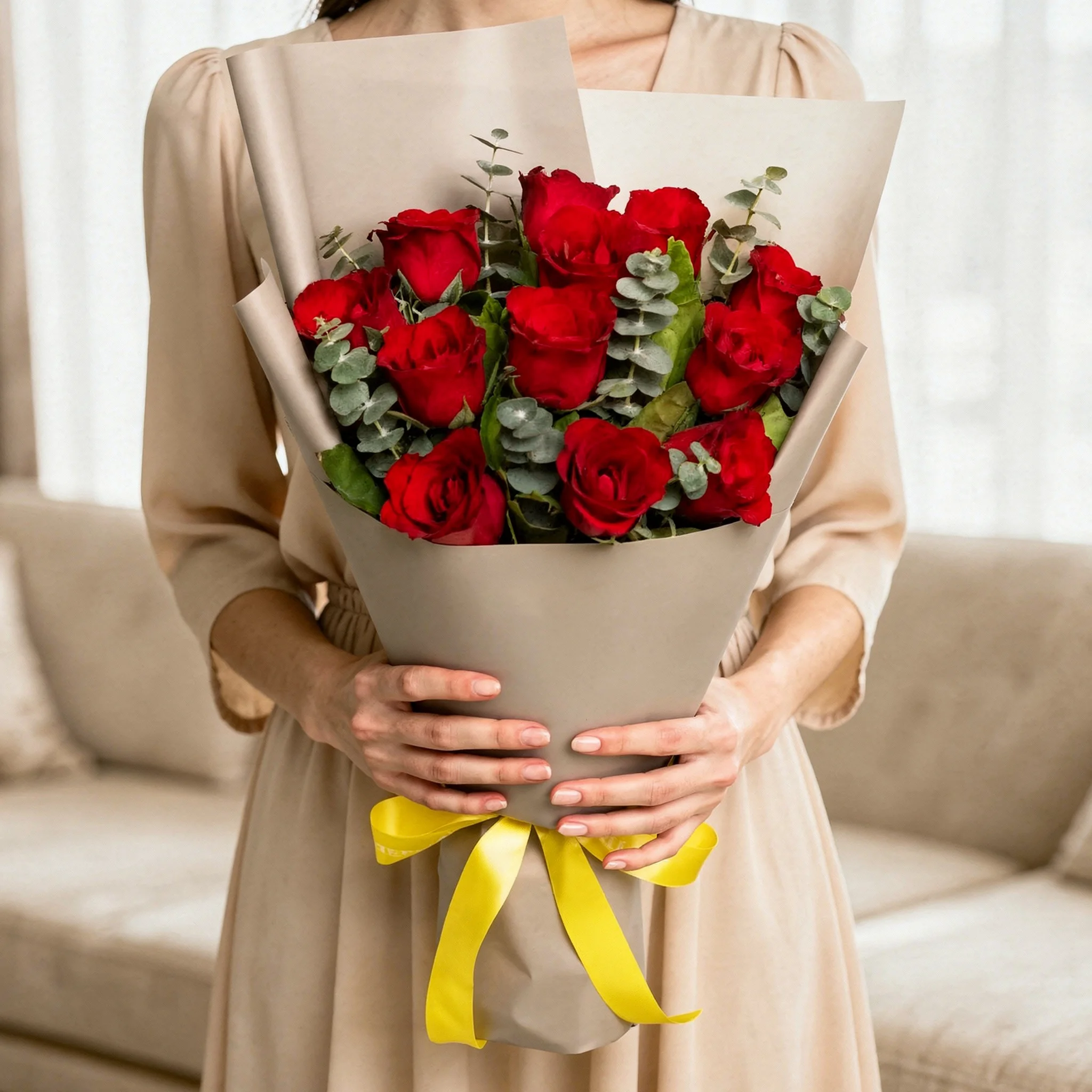 12 red roses with eucalyptus leaves and green fillers